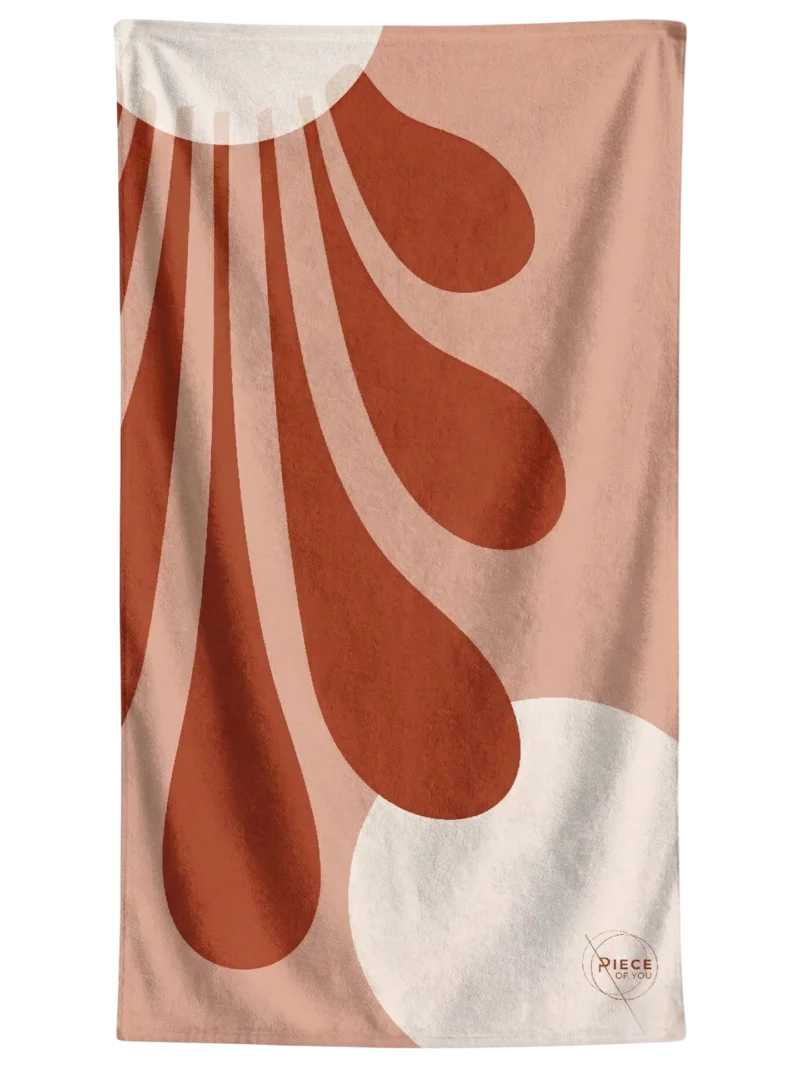 Anthemion Teracota towel with a warm, Mediterranean-inspired pattern.
