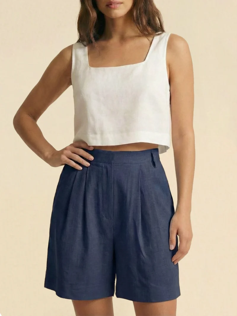 Blue navy shorts in a minimalist, relaxed silhouette.