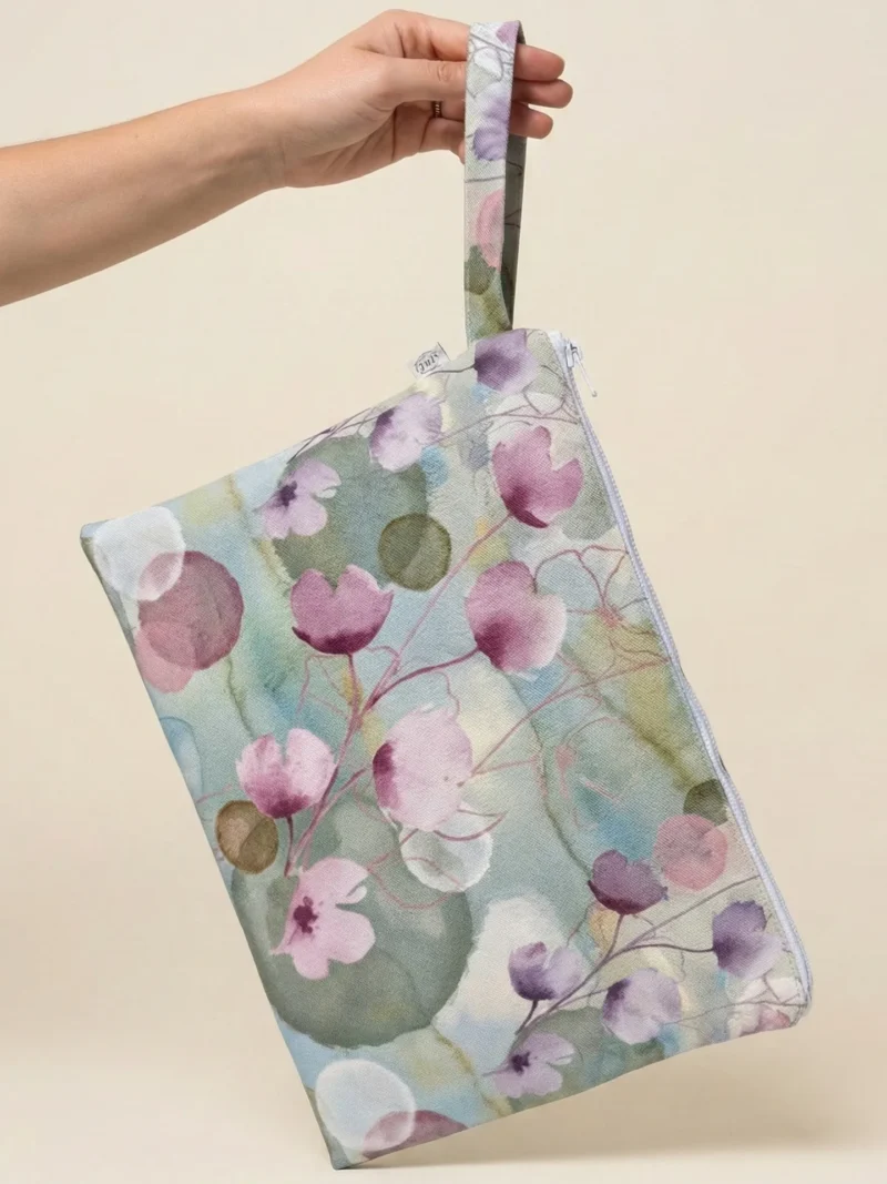 Handbag with Lathyrus flower print in soft pastel shades.