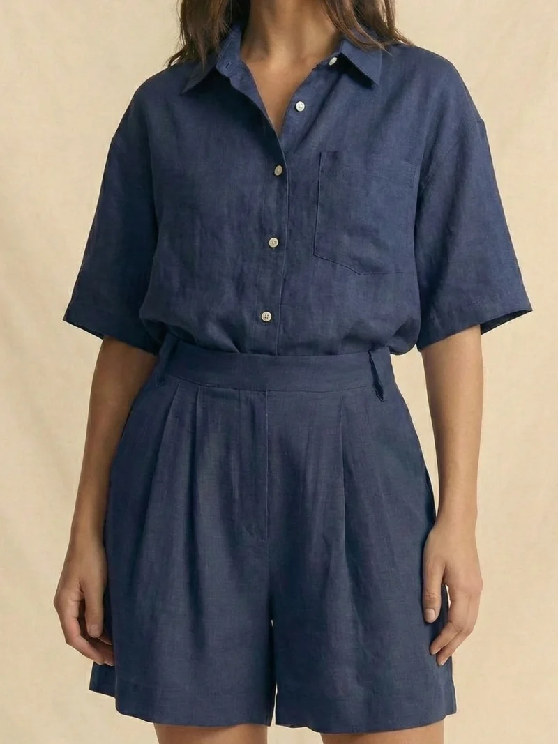 Navy blue shirt in a clean, timeless design.