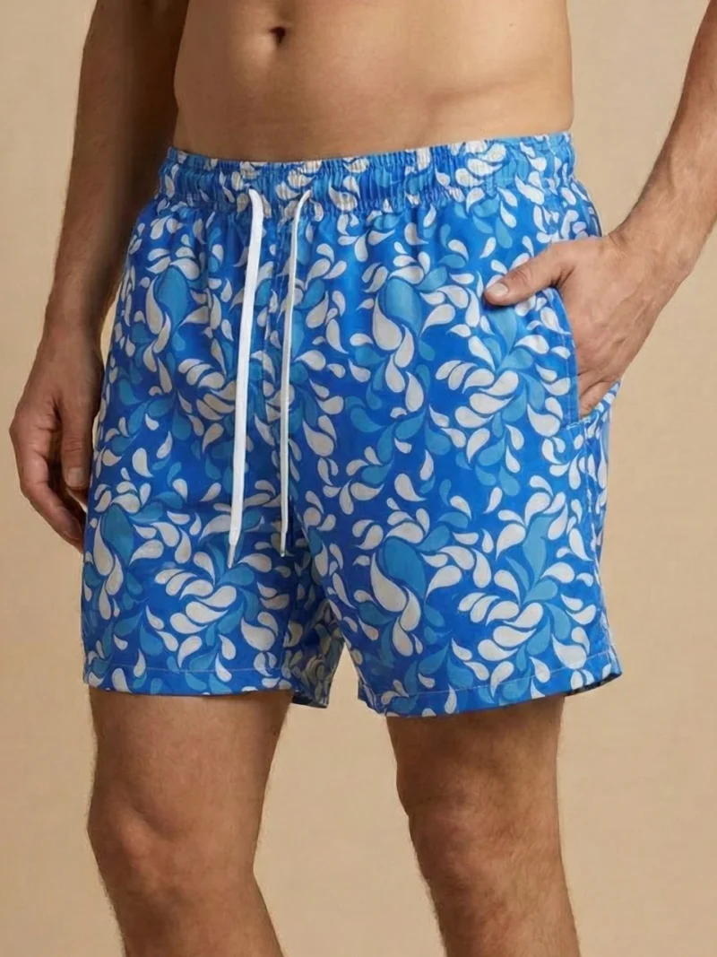 Stagones men’s swimwear featuring a fluid, water-inspired pattern.